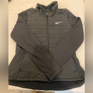Nike quilted running jacket black. Size XL fleece material inside.